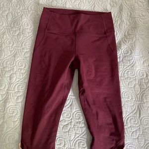 Purple/magenta Fabletics leggings